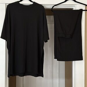 Dressed in Lala black playsuit size large